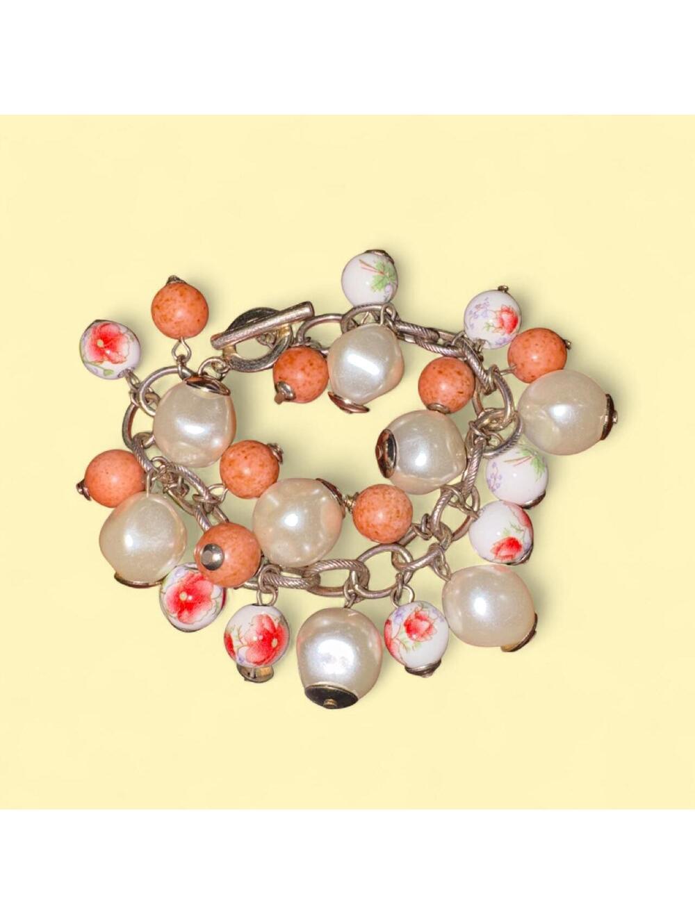 Vintage rare -colored beaded bracelet with white beads featuring red floral